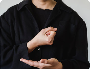 Boy showing hands signs